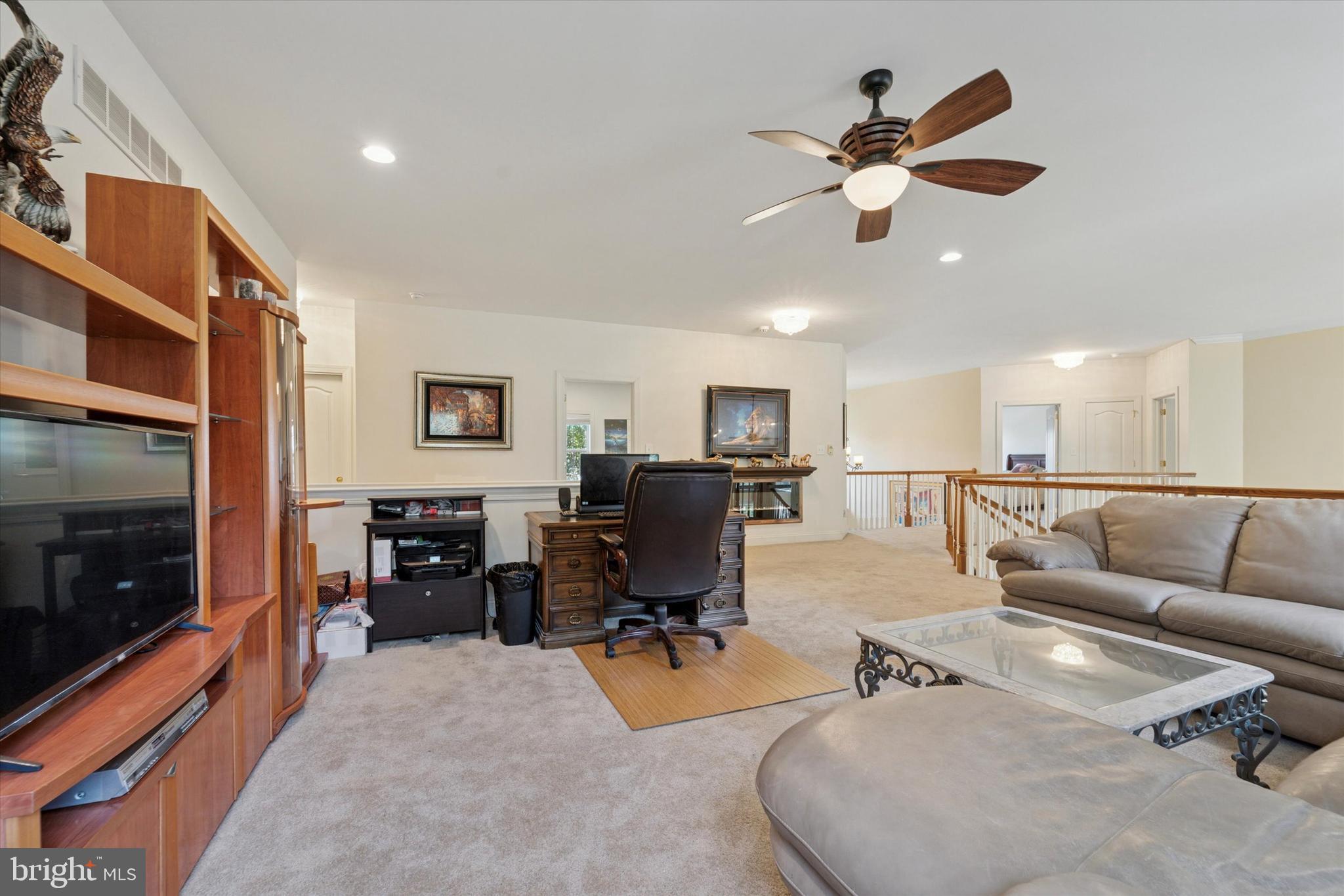 2001 Grenoble Road Coatesville, PA 19320 - Photo 21 of 45 a living room with furniture kitchen view and a fireplace