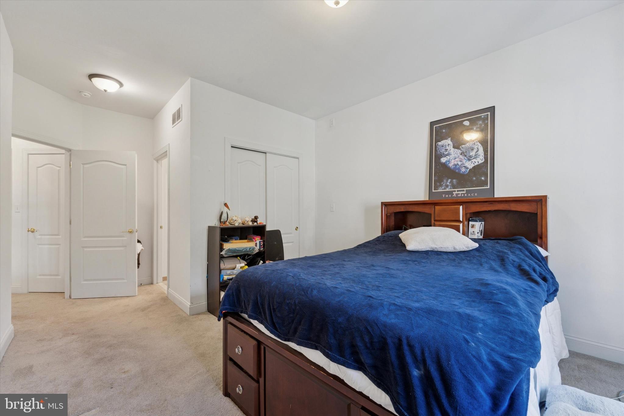 2001 Grenoble Road Coatesville, PA 19320 - Photo 27 of 45 a bedroom with a bed and a closet