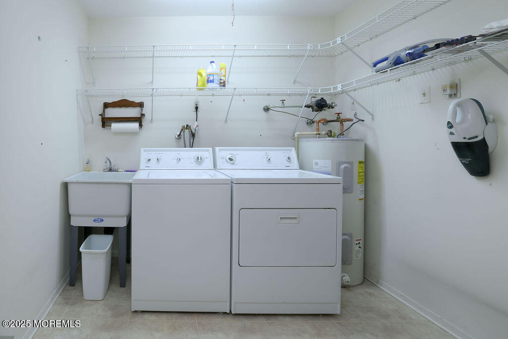 3 B Alpine Road, Unit 63 Whiting, NJ 08759 - Photo 13 of 26 a utility room with dryer and washer