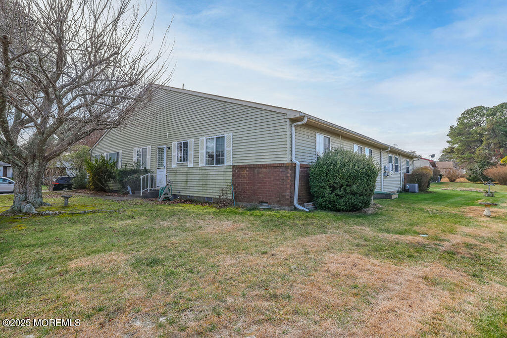 3 B Alpine Road, Unit 63 Whiting, NJ 08759 - Photo 26 of 26 a view of a house with a backyard