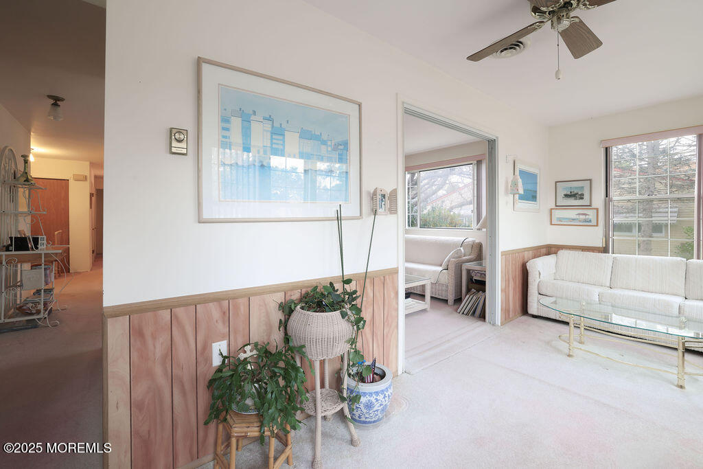 3 B Alpine Road, Unit 63 Whiting, NJ 08759 - Photo 3 of 26 a living room with furniture and a large window