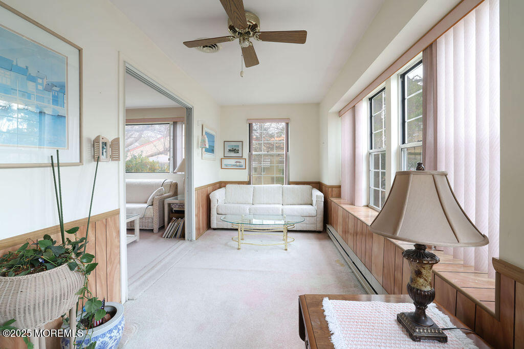3 B Alpine Road, Unit 63 Whiting, NJ 08759 - Photo 5 of 26 a living room with furniture and a large window