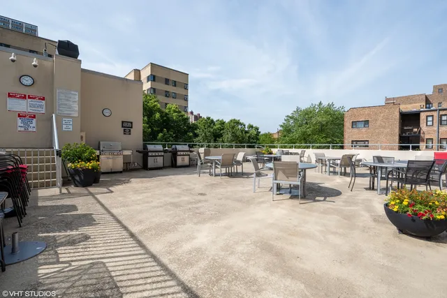 a view of a terrace with chairs
