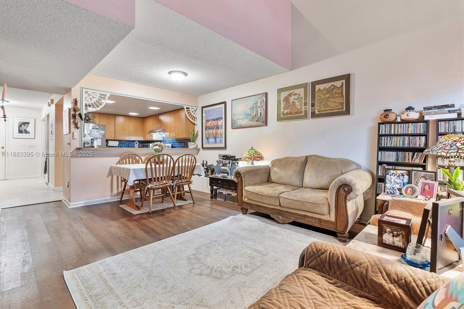 4347 Southwest 70th Terrace Davie, FL 33314 - Photo 3 of 32 a living room with furniture and a table