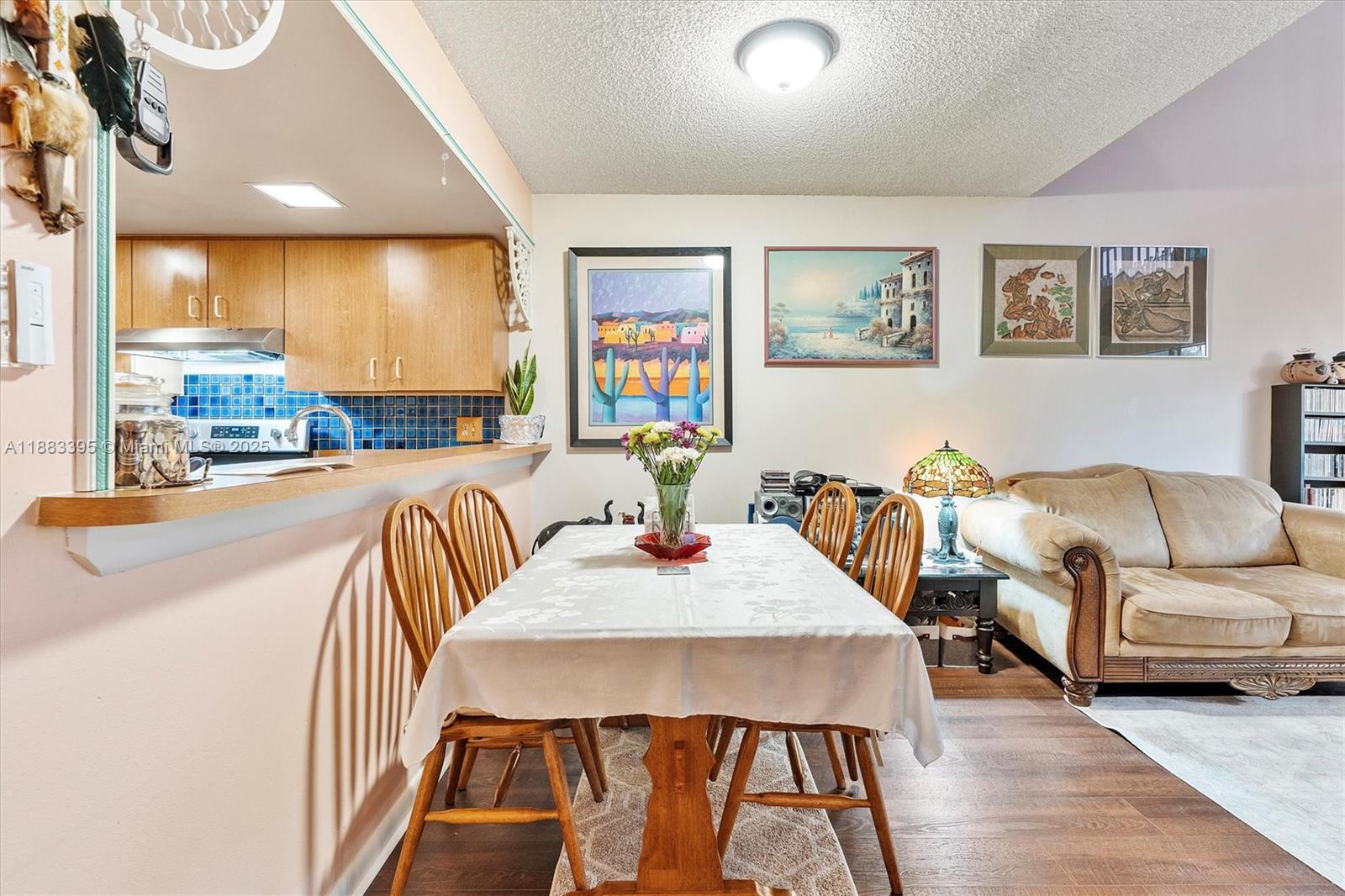 4347 Southwest 70th Terrace Davie, FL 33314 - Photo 8 of 32 a living room with furniture and a large window
