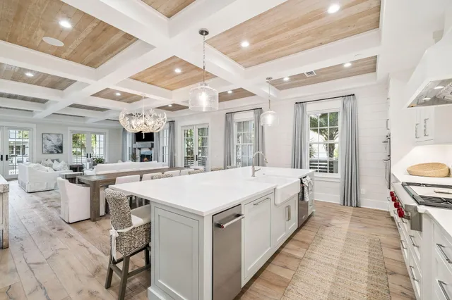 a utility room with sink dryer and washer