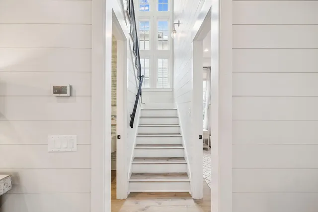 a bathroom with a shower and toilet