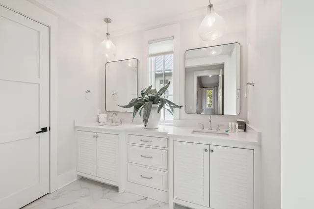 a view of entryway with wooden floor and stairs