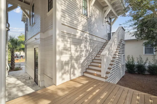 a view of a swimming pool with a lounge chairs