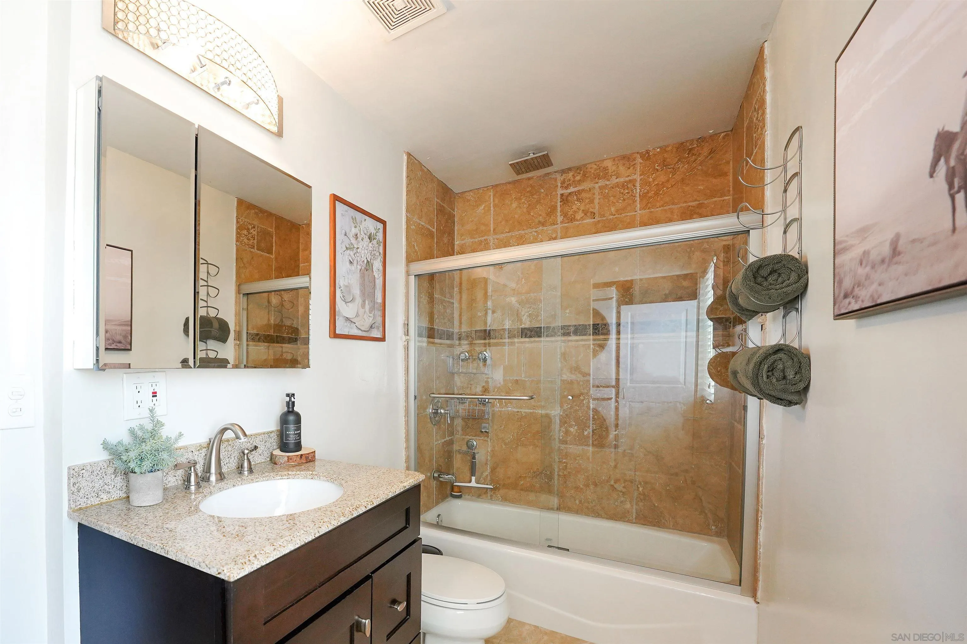 23658 Country Villa Road Ramona, CA 92065 - Photo 18 of 29 a bathroom with a sink and a mirror