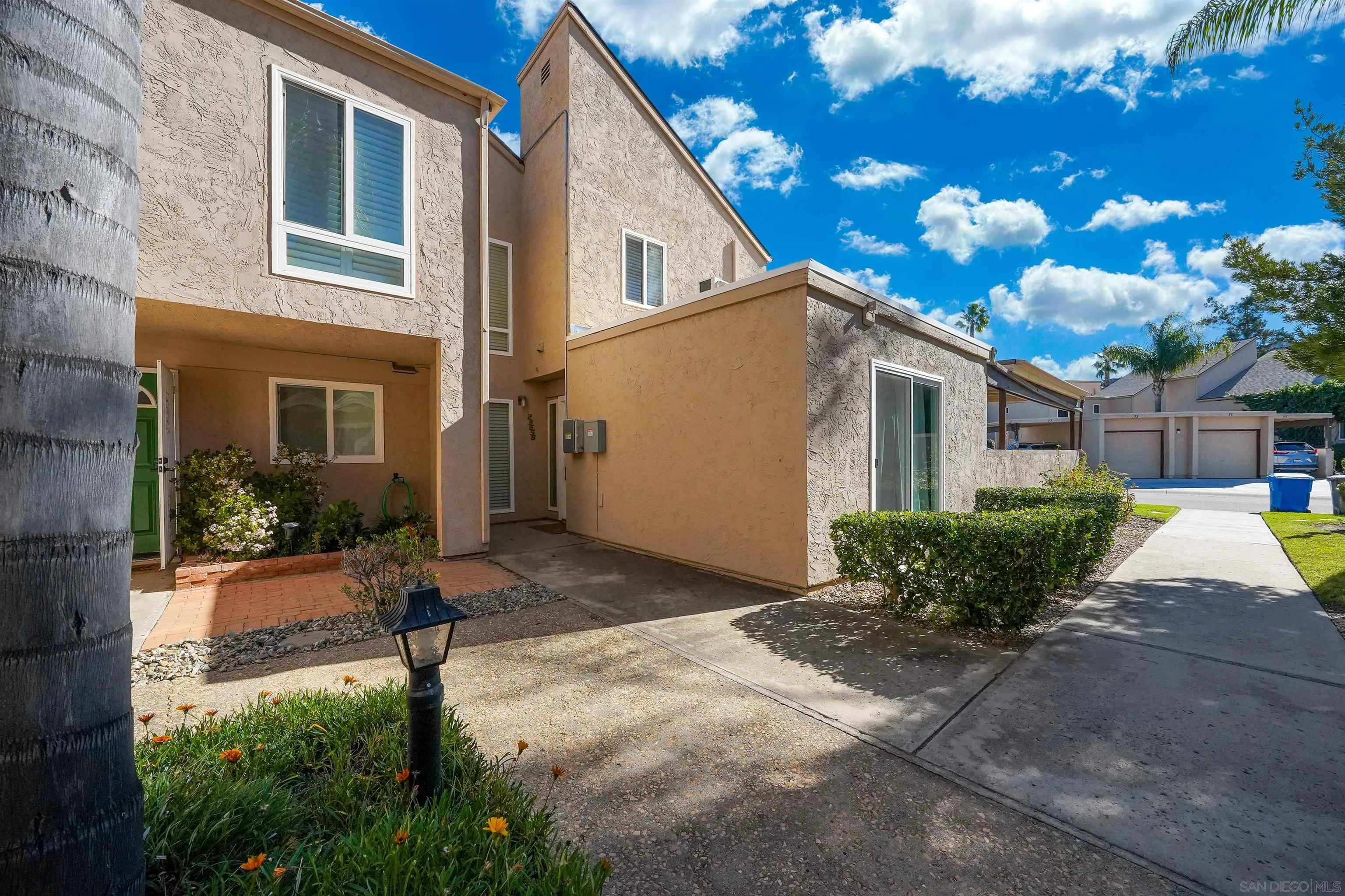23658 Country Villa Road Ramona, CA 92065 - Photo 20 of 29 a front view of a house with garden