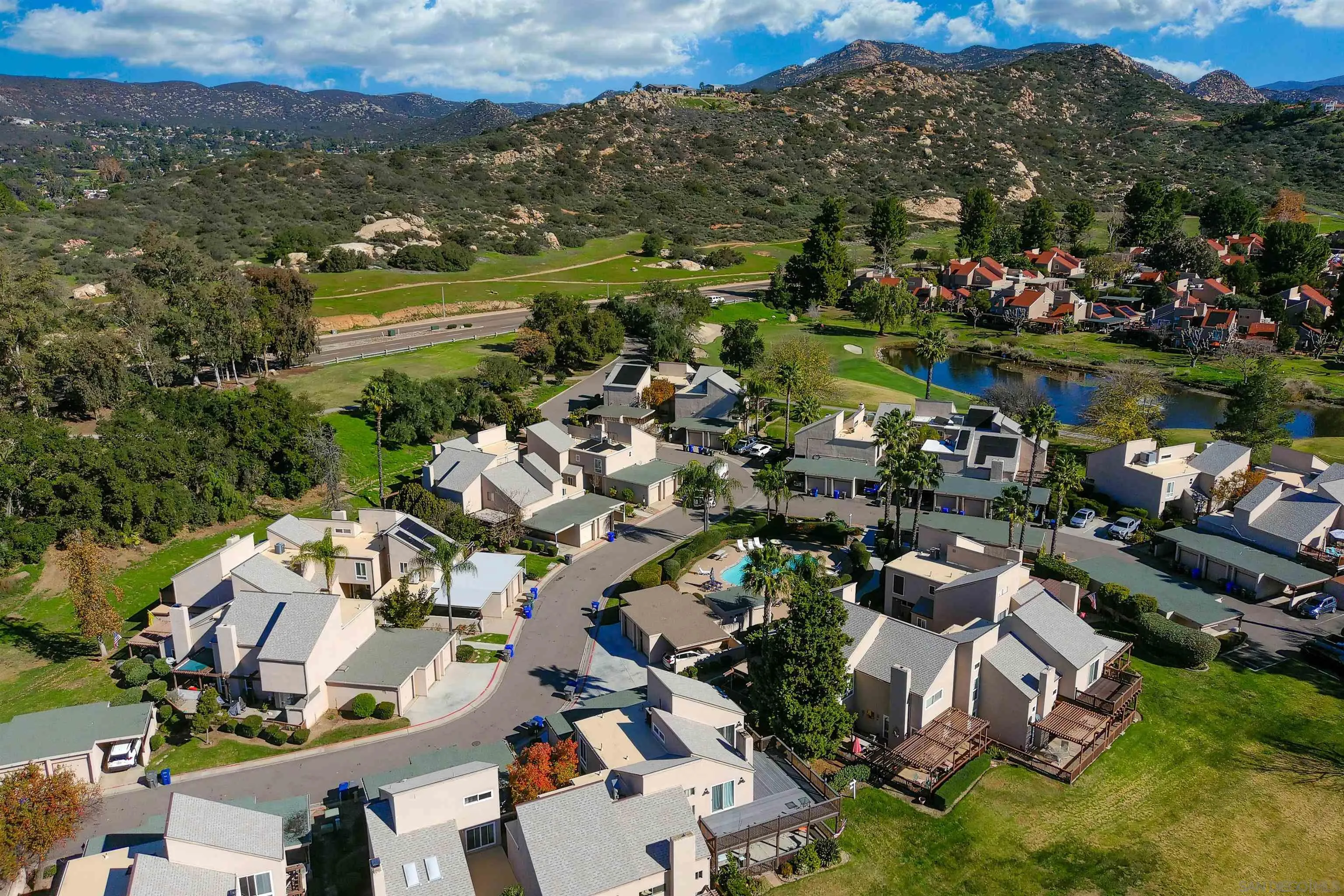 23658 Country Villa Road Ramona, CA 92065 - Photo 28 of 29 an aerial view of a city with lots of residential buildings lake and ocean view