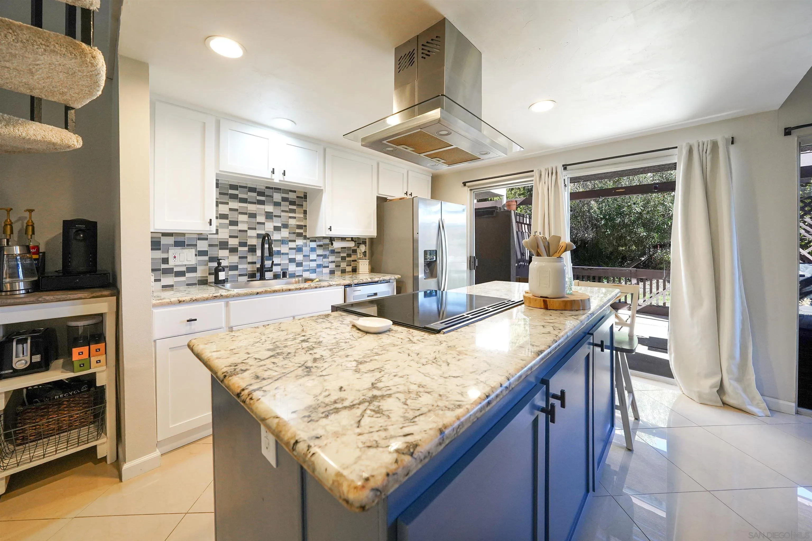 23658 Country Villa Road Ramona, CA 92065 - Photo 6 of 29 a kitchen with a stove and a refrigerator