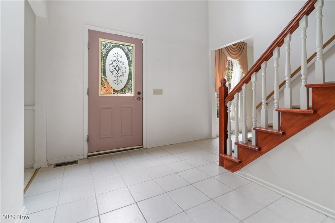 4057 Etter Road Mogadore, OH 44260 - Photo 5 of 41 Foyer featuring light tile patterned floors