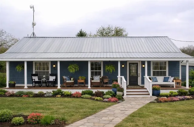 a view of a house with sitting area and garden