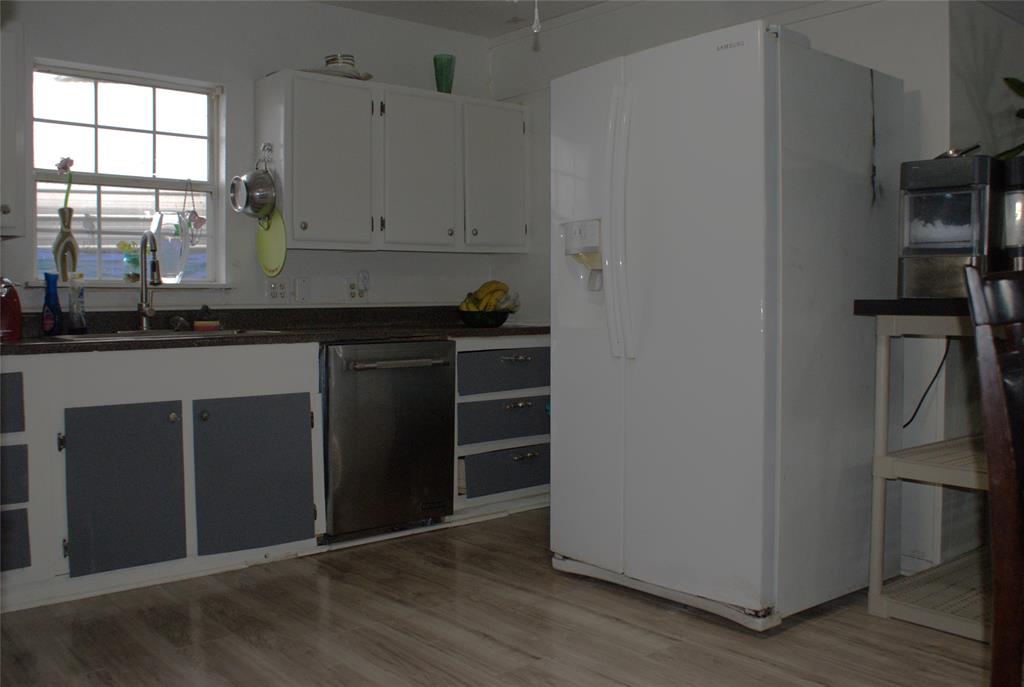8660 County Road 308 Terrell, TX 75161 - Photo 7 of 18 a kitchen with stainless steel appliances granite countertop a refrigerator and a sink