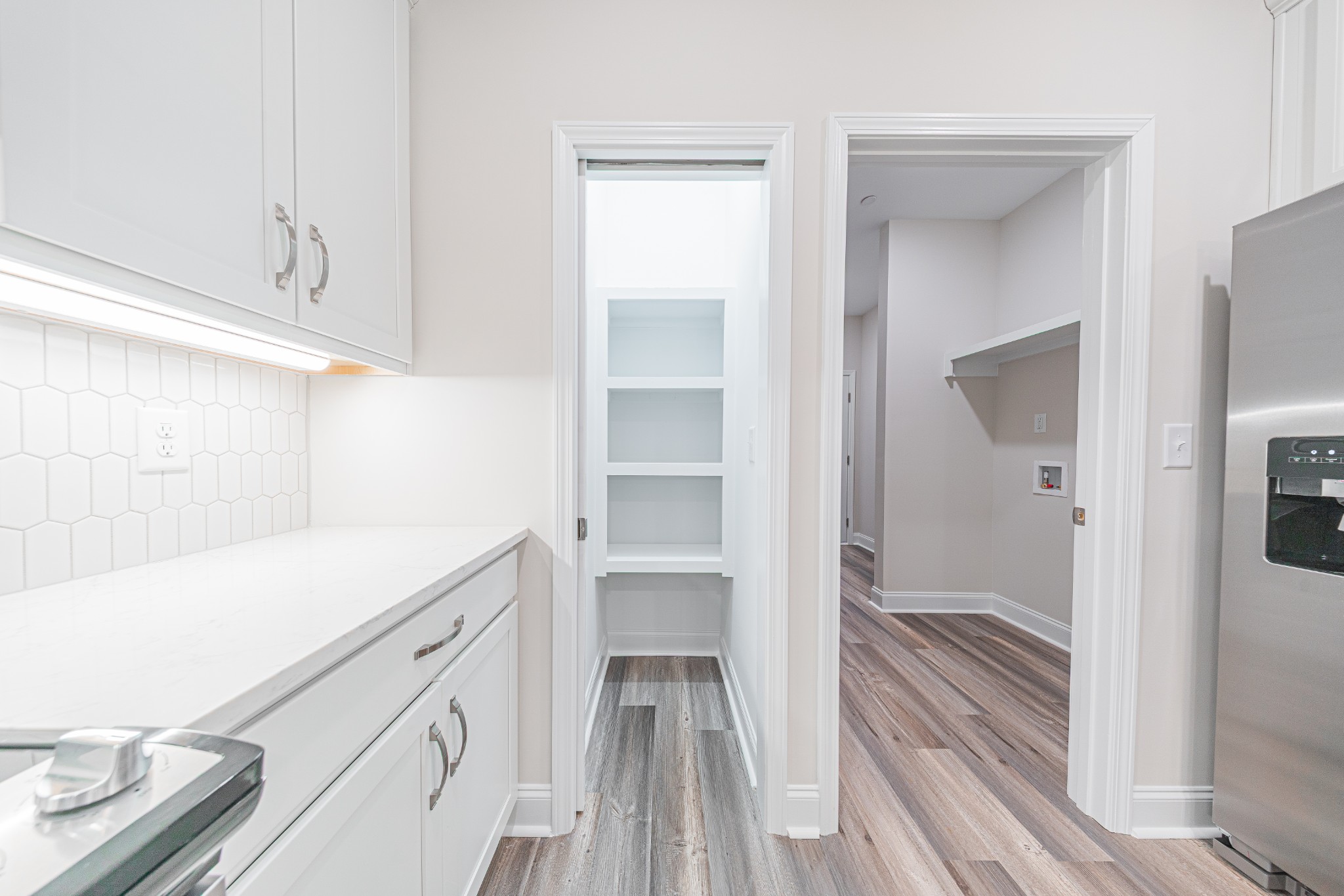 110 Gower Street Pleasant View, TN 37146 - Photo 13 of 32 a kitchen with a sink and refrigerator