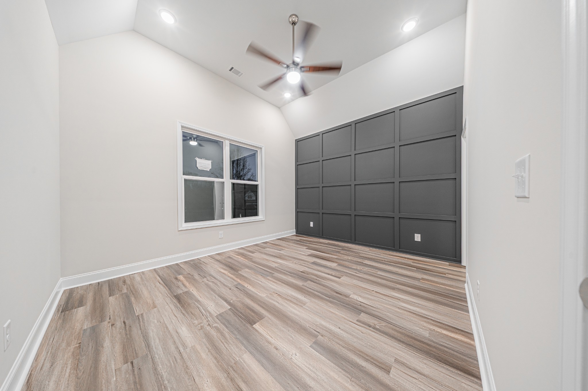 110 Gower Street Pleasant View, TN 37146 - Photo 17 of 32 a view of empty room with wooden floor and fan