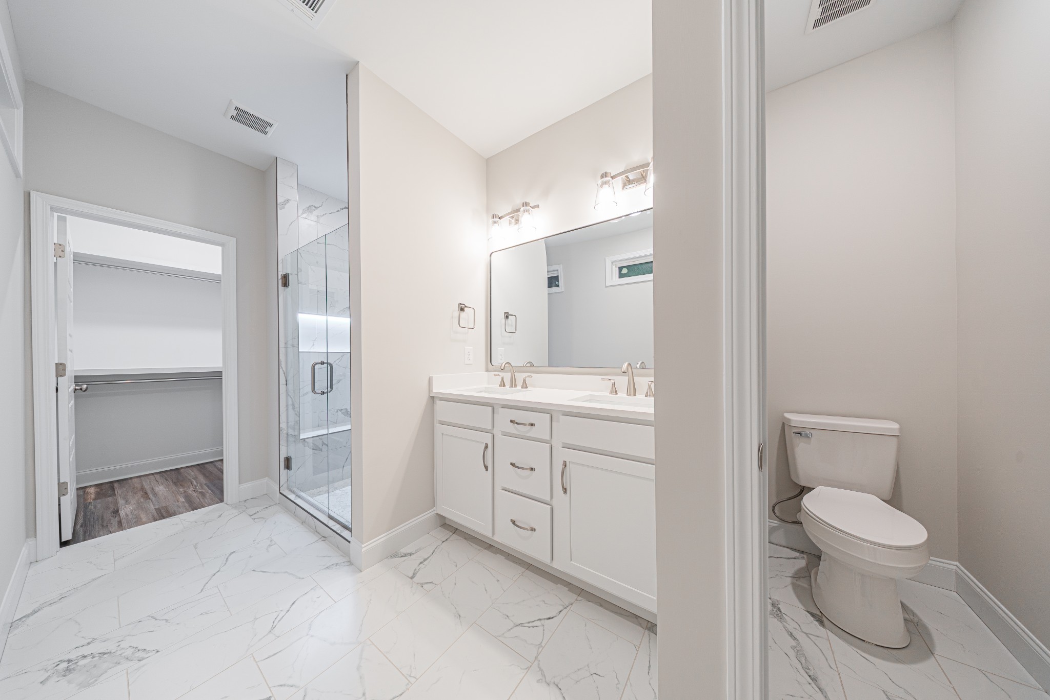 110 Gower Street Pleasant View, TN 37146 - Photo 19 of 32 a spacious bathroom with a toilet sink and a shower