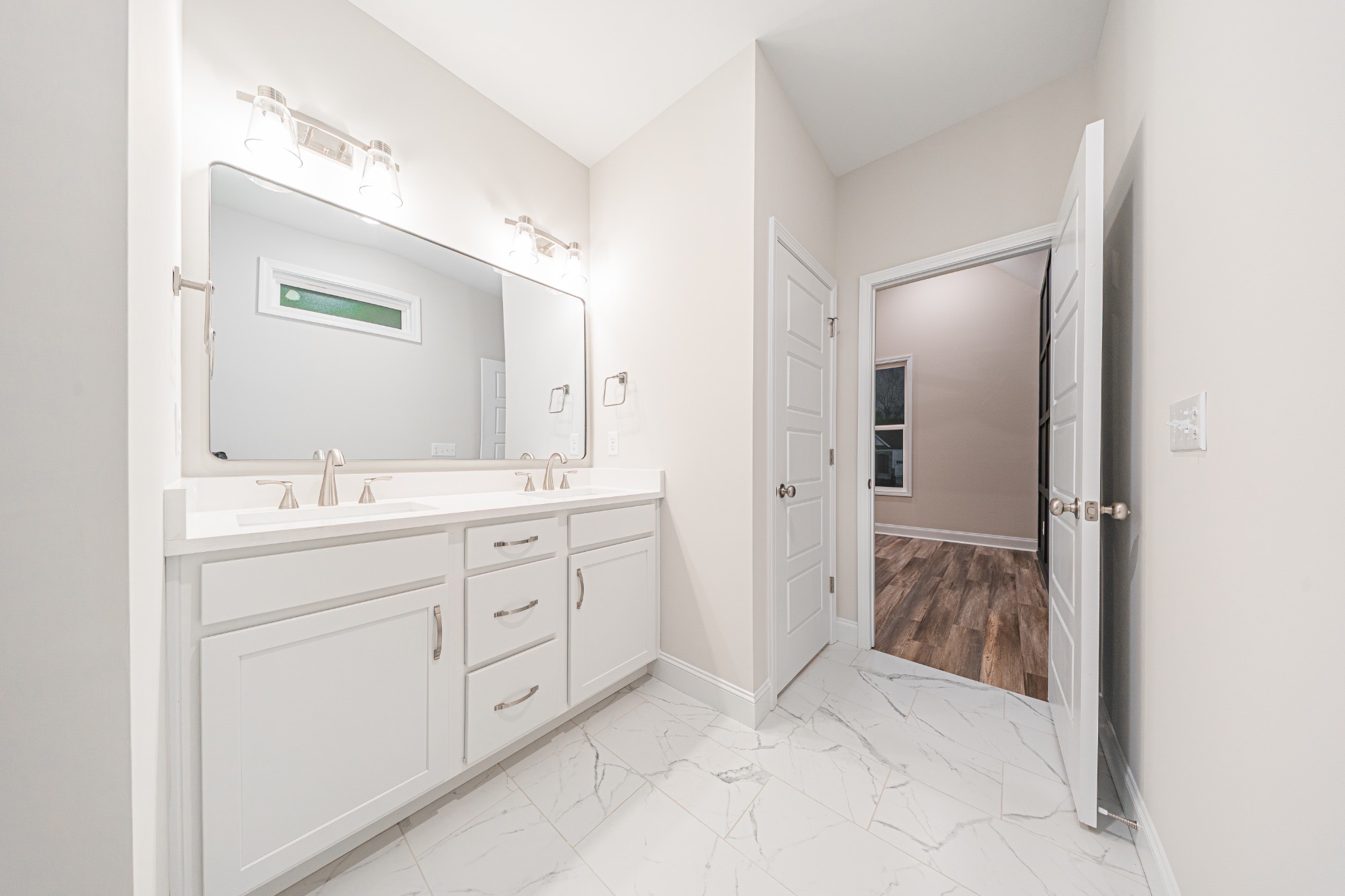 110 Gower Street Pleasant View, TN 37146 - Photo 21 of 32 a spacious bathroom with a shower sink and mirror