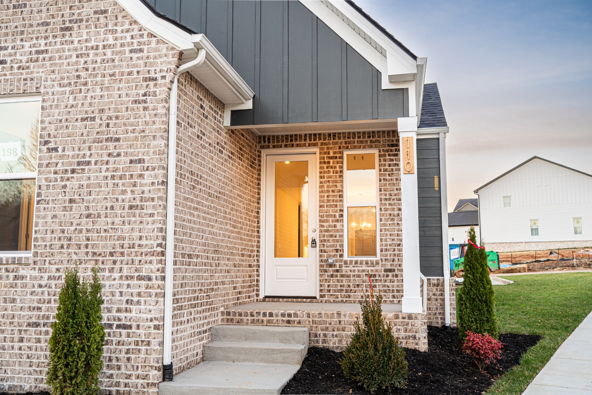 110 Gower Street Pleasant View, TN 37146 - Photo 5 of 32 a front view of a house with a garden