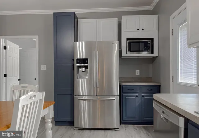 a view of front door with wooden fence