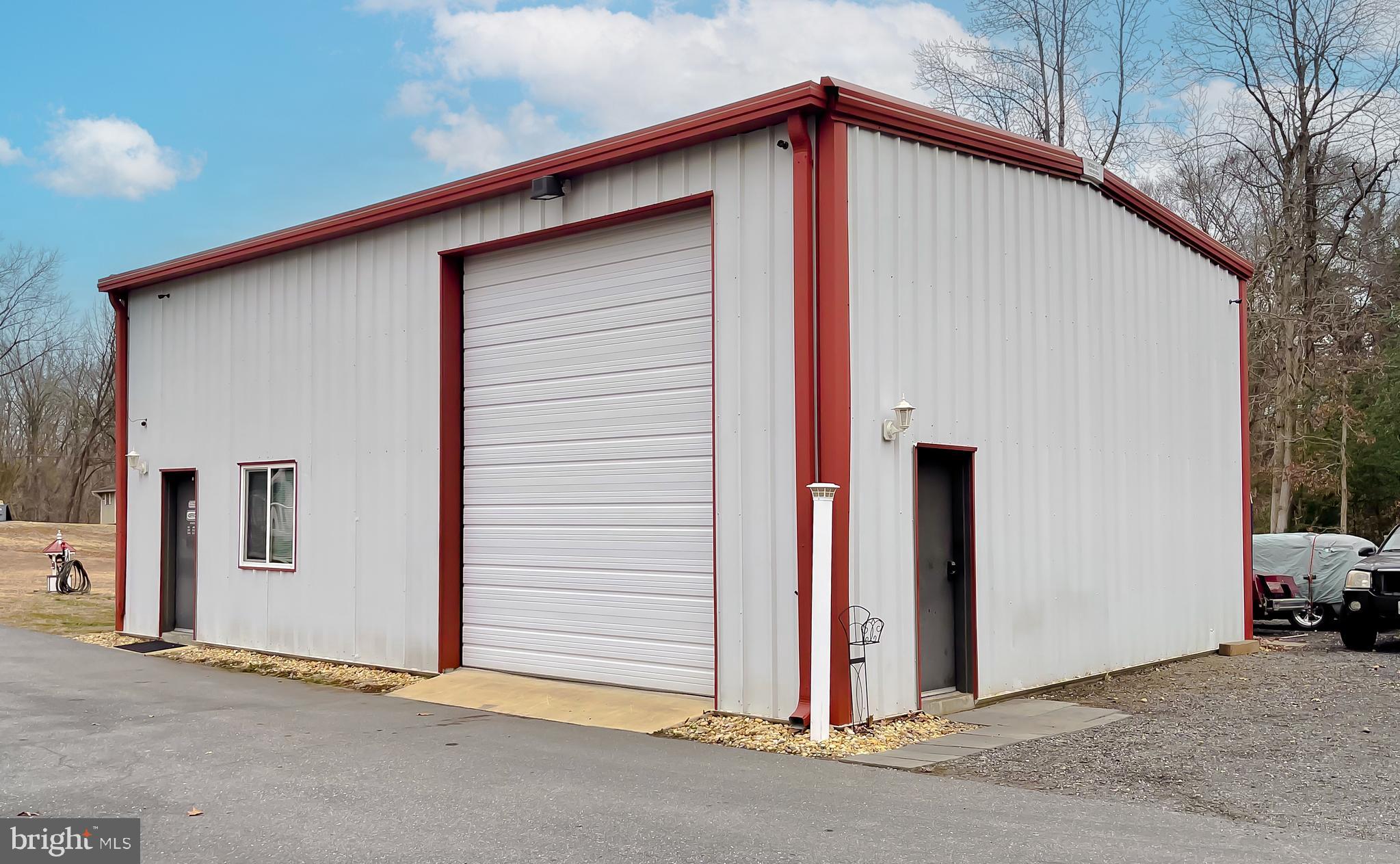 400 Adelina Road Prince Frederick, MD 20678 - Photo 61 of 65 Metal Garage/ Workshop with Roll-Up Door