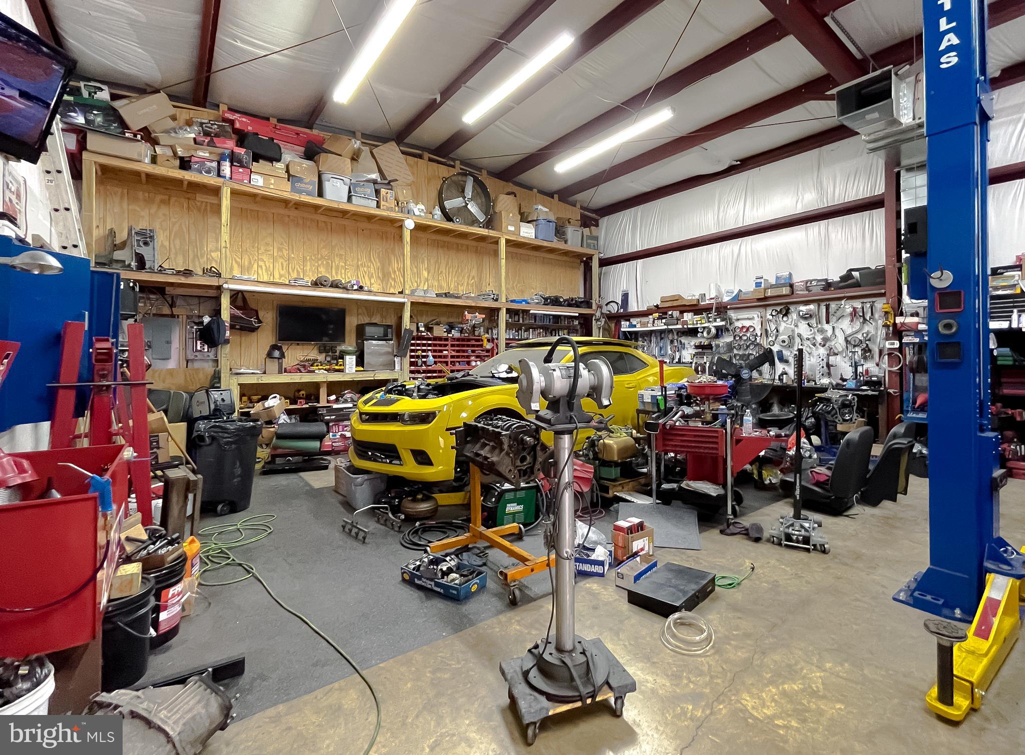 400 Adelina Road Prince Frederick, MD 20678 - Photo 62 of 65 Metal Garage/ Workshop Floor to Ceiling Shelves