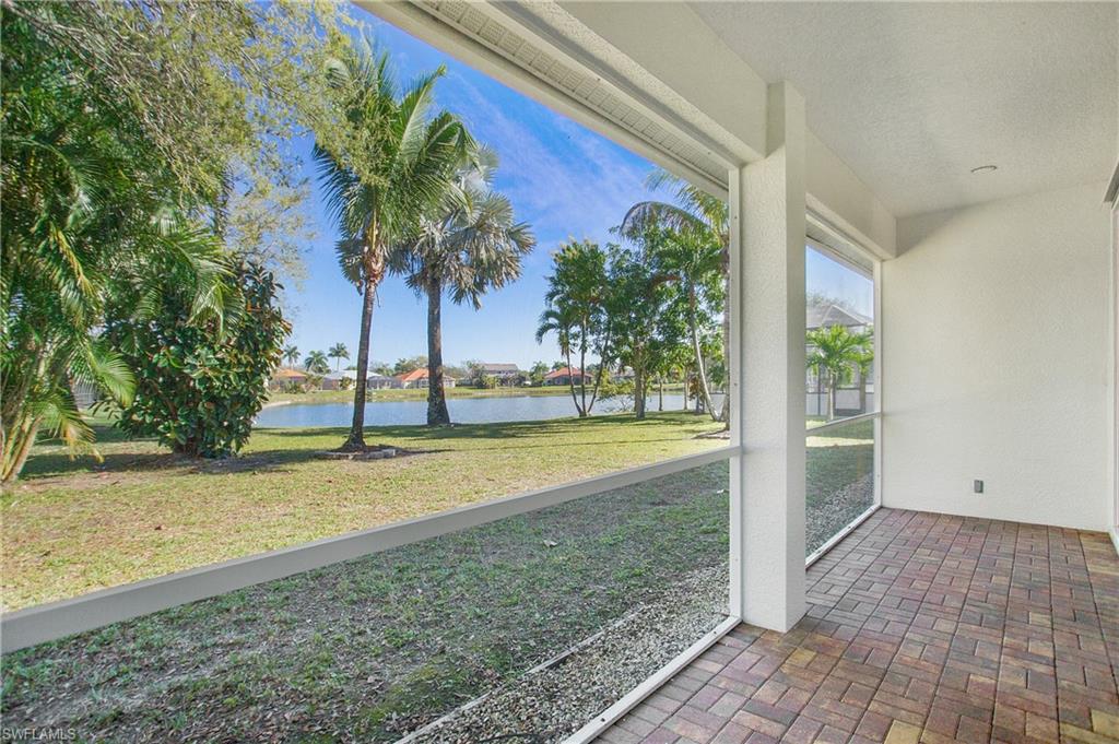 2921 Inlet Cove Lane East Naples, FL 34120 - Photo 30 of 48 a view of a yard with an outdoor space