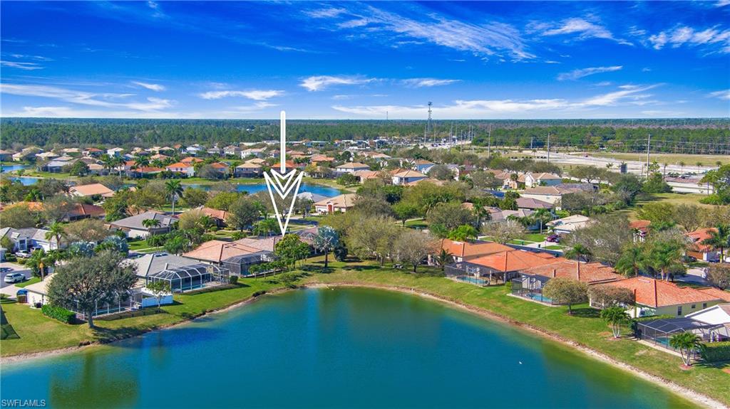 2921 Inlet Cove Lane East Naples, FL 34120 - Photo 31 of 48 an aerial view of residential houses with outdoor space and swimming pool