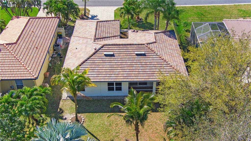 2921 Inlet Cove Lane East Naples, FL 34120 - Photo 38 of 48 an aerial view of a house with a yard and potted plants