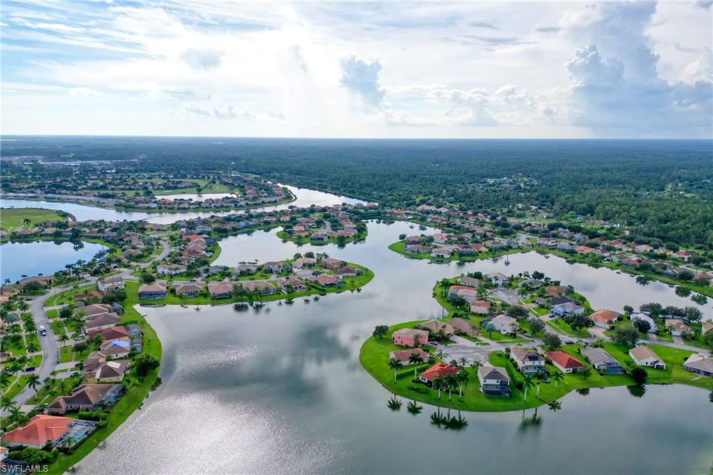 2921 Inlet Cove Lane East Naples, FL 34120 - Photo 42 of 48 a view of a lake with outdoor space