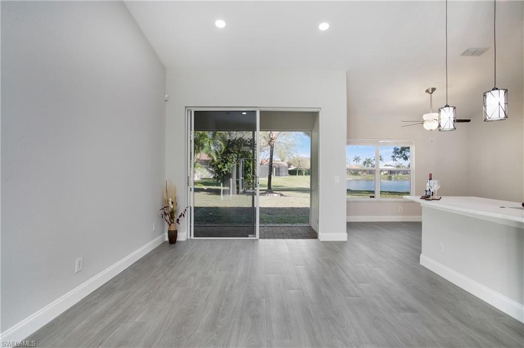 2921 Inlet Cove Lane East Naples, FL 34120 - Photo 10 of 48 a view of empty room with wooden floor