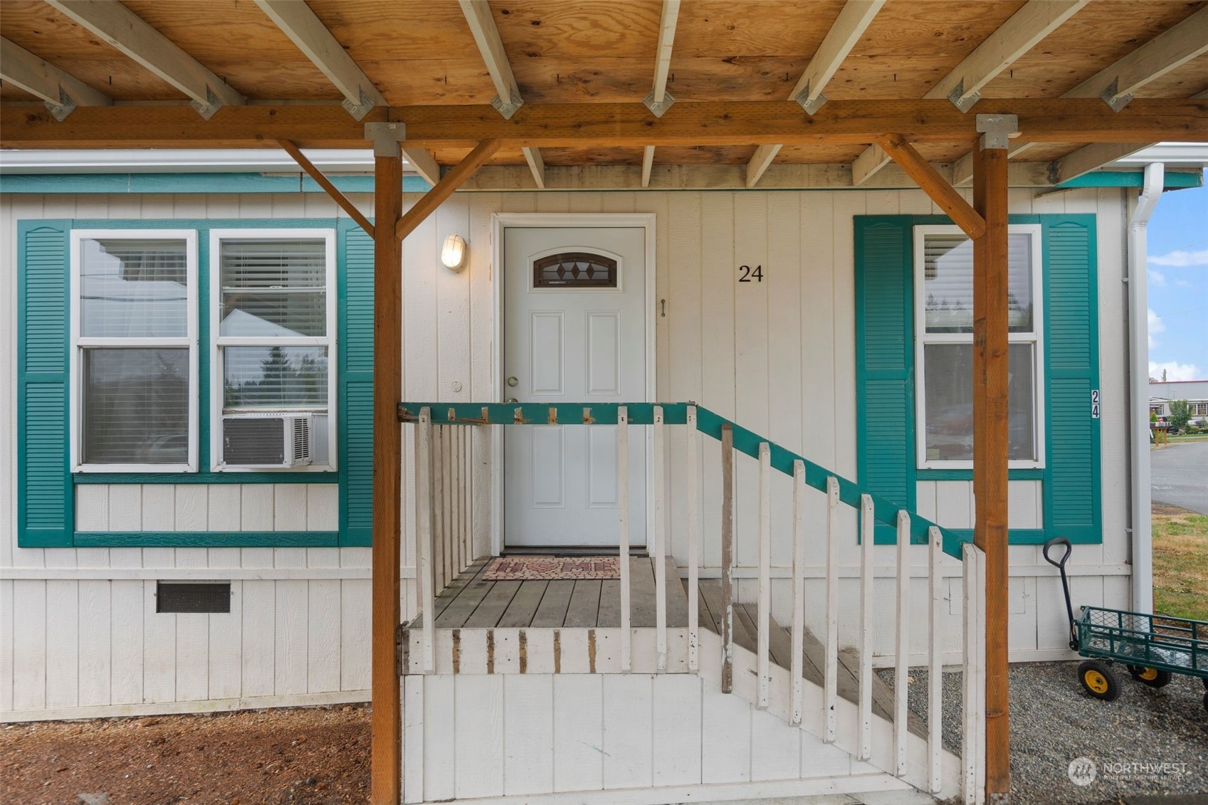 8730 206th Street Southeast, Unit 24 Snohomish, WA 98296 - Photo 3 of 33 a view of staircase with railing and white walls