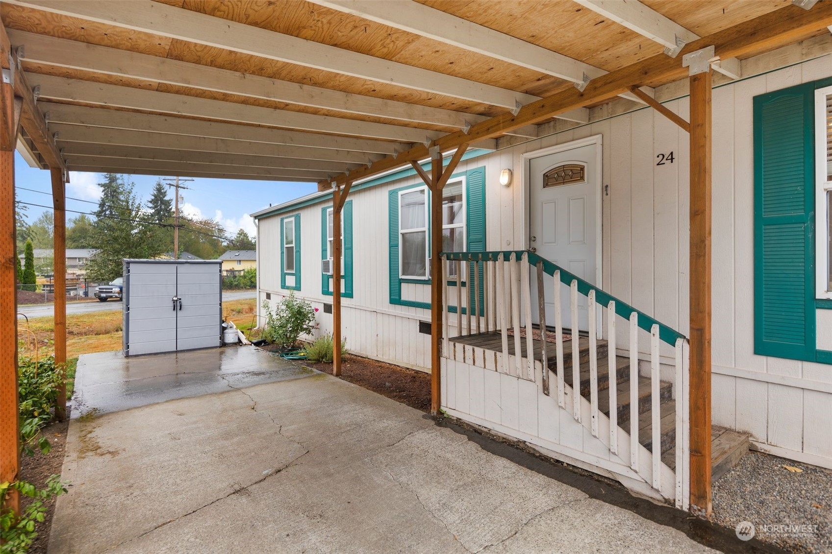 8730 206th Street Southeast, Unit 24 Snohomish, WA 98296 - Photo 33 of 33 a view of a porch with furniture