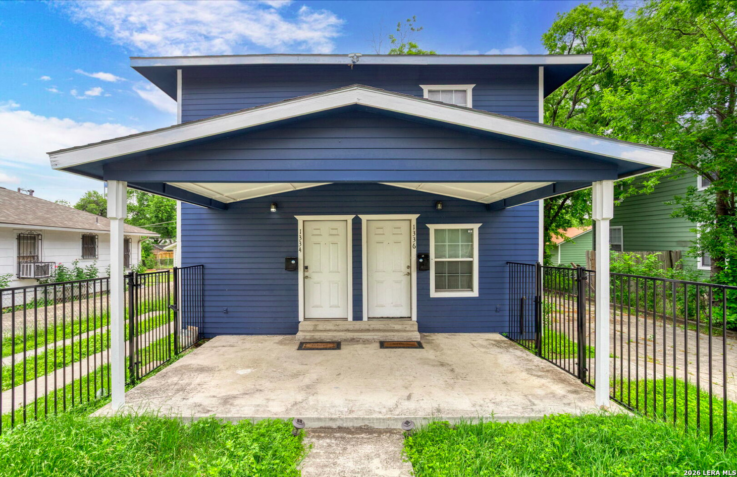 a front view of a house with a porch