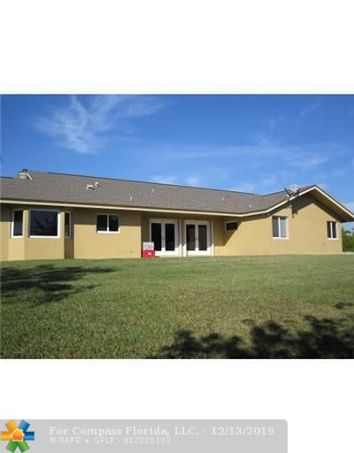 16700 Southwest 64th Street Southwest Ranches, FL 33331 - Photo 3 of 16 Exterior Back