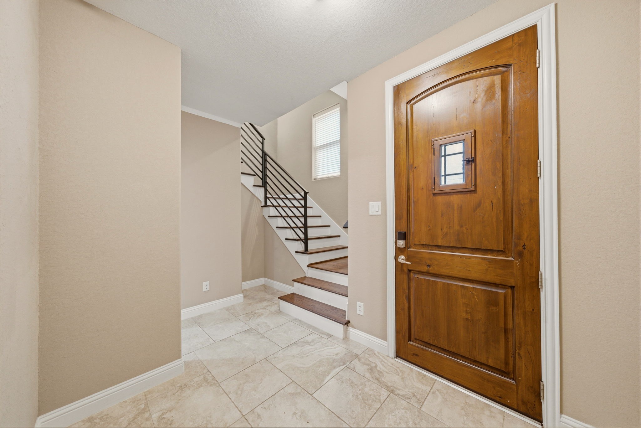 1113 West 18th Street, Unit A Houston, TX 77008 - Photo 3 of 21 a view of entryway and hall with wooden floor