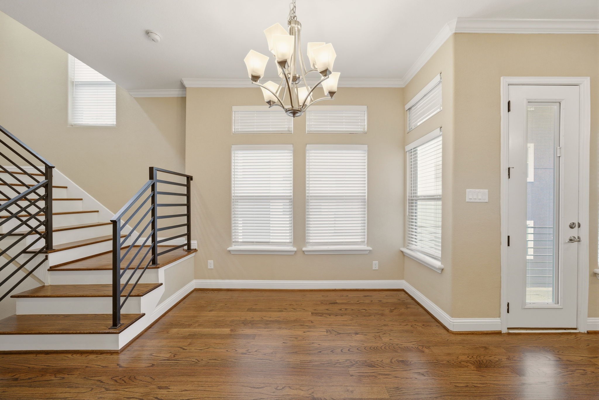 1113 West 18th Street, Unit A Houston, TX 77008 - Photo 10 of 21 wooden floor in an empty room with a window