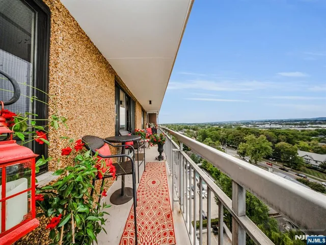 a view of street from balcony