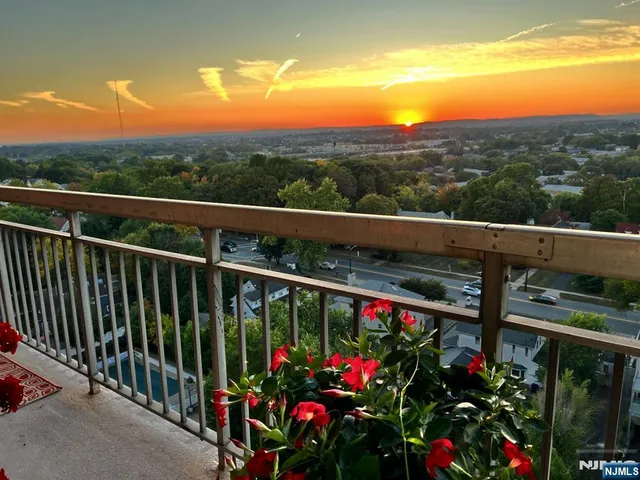 a view of street from balcony