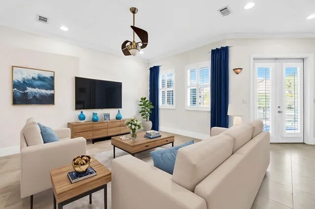 a view of livingroom with furniture and windows