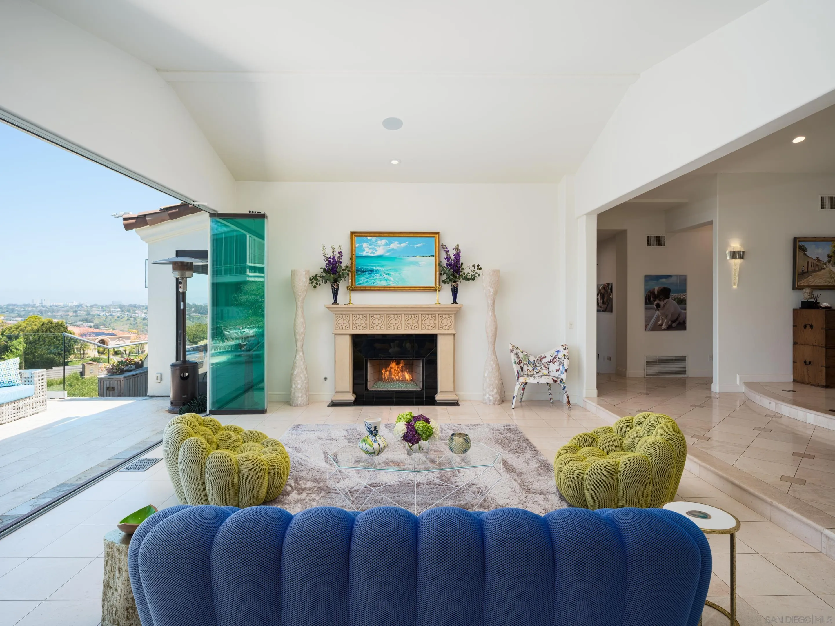 7403 Hillside Drive La Jolla, CA 92037 - Photo 14 of 52 a living room with furniture and a fireplace