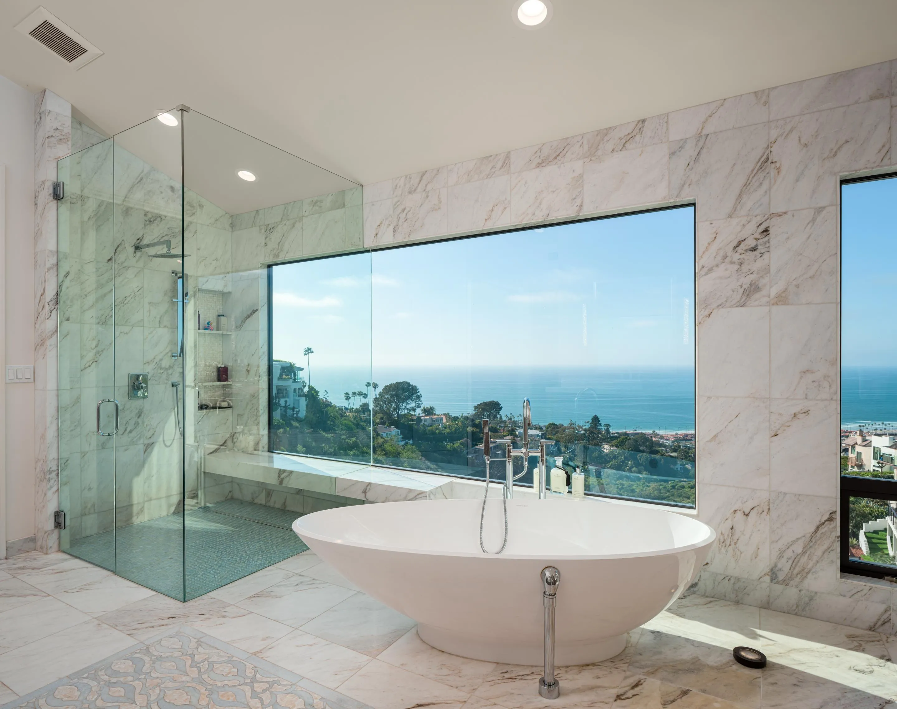 7403 Hillside Drive La Jolla, CA 92037 - Photo 18 of 52 a bathroom with a bathtub and shower