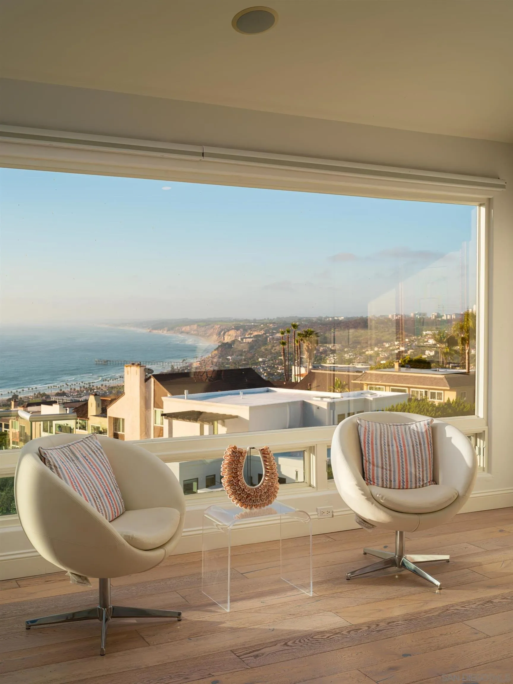 7403 Hillside Drive La Jolla, CA 92037 - Photo 26 of 52 a table with a table and chairs