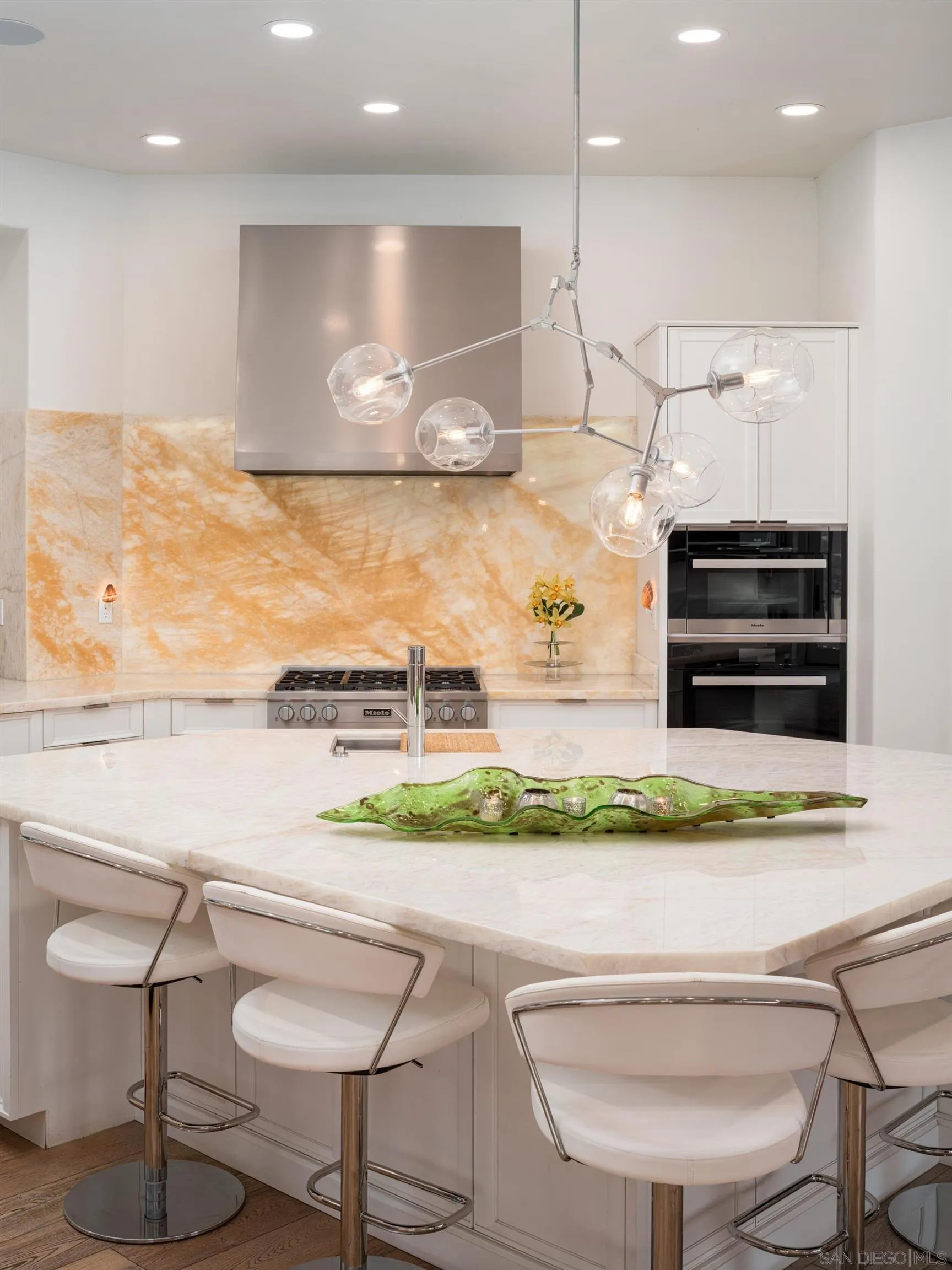 7403 Hillside Drive La Jolla, CA 92037 - Photo 32 of 52 a kitchen with a stove and a refrigerator