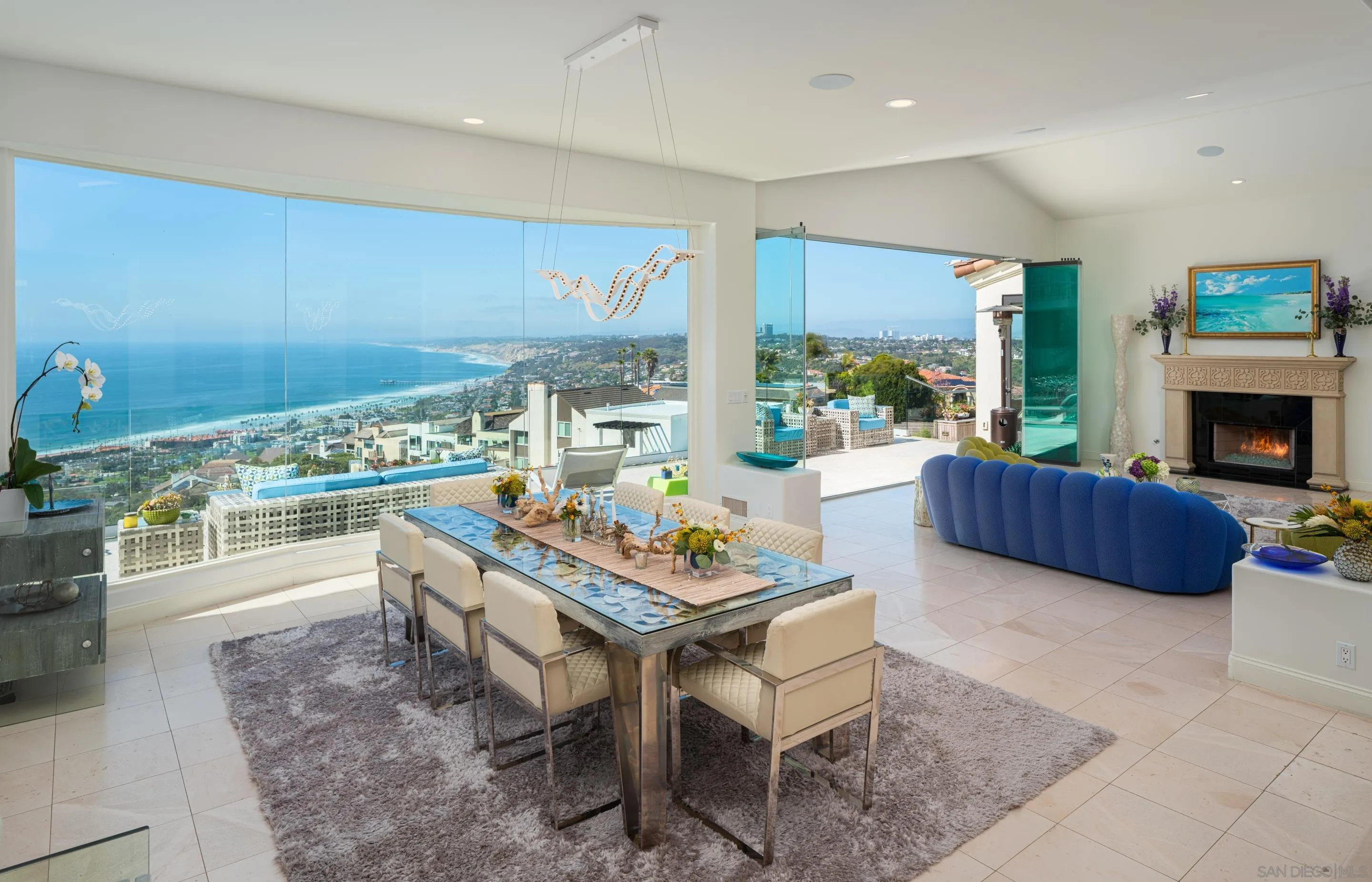 7403 Hillside Drive La Jolla, CA 92037 - Photo 5 of 52 a living room with furniture and a fireplace