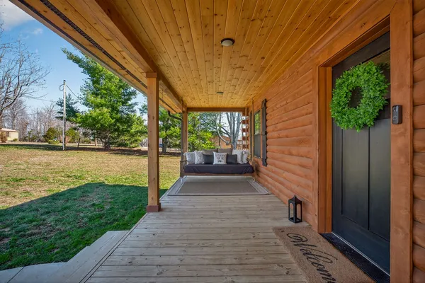 a view of a patio with a yard