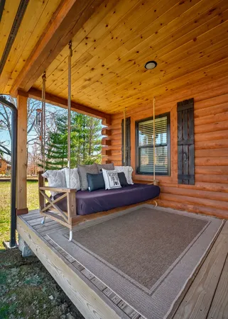 a outdoor living space with furniture and a potted plant