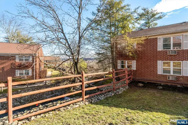 a view of building with brick walls